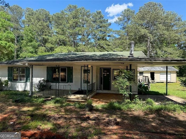 1272 Cave Springs Rd, Douglasville, GA 30134 - view of front of home with a porch and a front yard