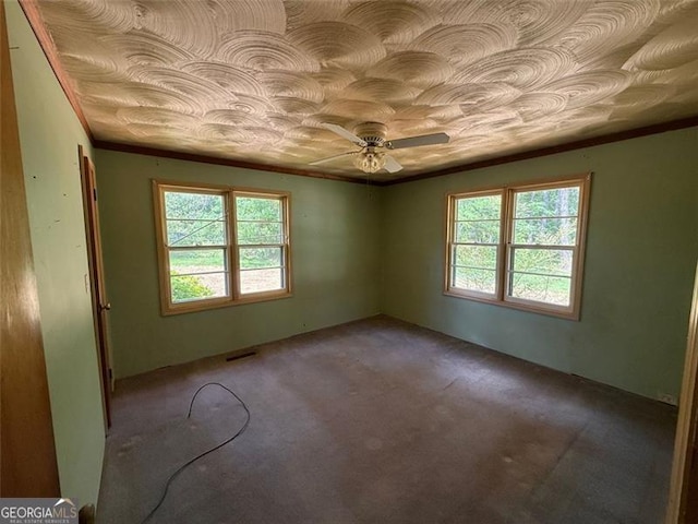 1272 Cave Springs Rd, Douglasville, GA 30134 - spare room with carpet flooring, a ceiling fan, and crown molding