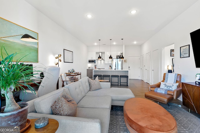 112 Rogers St NE Unit 410, Atlanta, GA 30317 - living area with dark wood-type flooring and recessed lighting