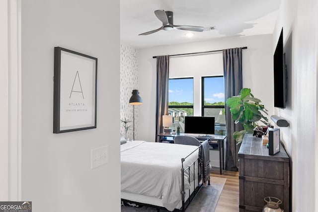 112 Rogers St NE Unit 410, Atlanta, GA 30317 - bedroom with wood finished floors and a ceiling fan