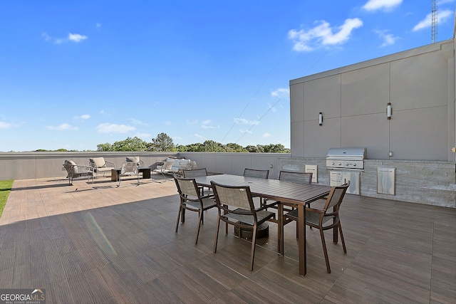 112 Rogers St NE Unit 410, Atlanta, GA 30317 - deck with outdoor dining area, an outdoor hangout area, and a patio area