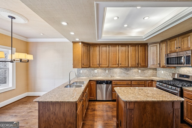51 Ivy Chase NE, Atlanta, GA 30342 - kitchen featuring stainless steel appliances, crown molding, dark wood finished floors, brown cabinetry, and light stone countertops