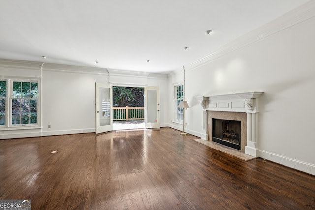 51 Ivy Chase NE, Atlanta, GA 30342 - unfurnished living room with crown molding, healthy amount of natural light, wood finished floors, and a fireplace