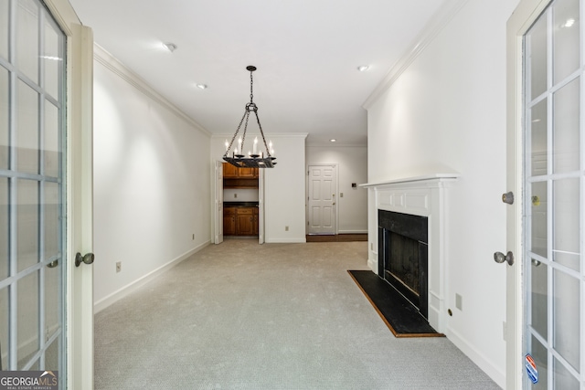 51 Ivy Chase NE, Atlanta, GA 30342 - unfurnished living room featuring french doors, crown molding, light carpet, a chandelier, and a fireplace