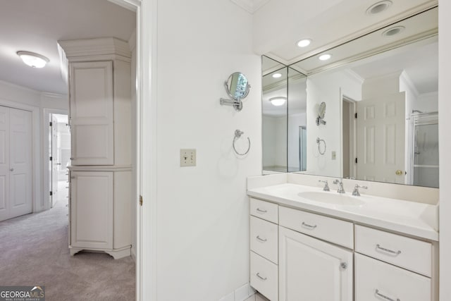 51 Ivy Chase NE, Atlanta, GA 30342 - bathroom with ornamental molding, vanity, and recessed lighting