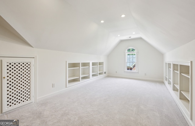 51 Ivy Chase NE, Atlanta, GA 30342 - additional living space featuring vaulted ceiling, built in features, carpet, and recessed lighting