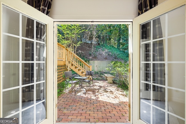 51 Ivy Chase NE, Atlanta, GA 30342 - doorway to outside featuring brick flooring