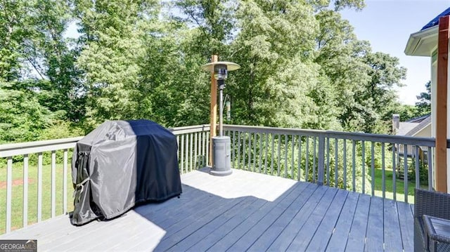 118 Valleyside Dr, Dallas, GA 30157 - wooden deck with a grill and view of scattered trees