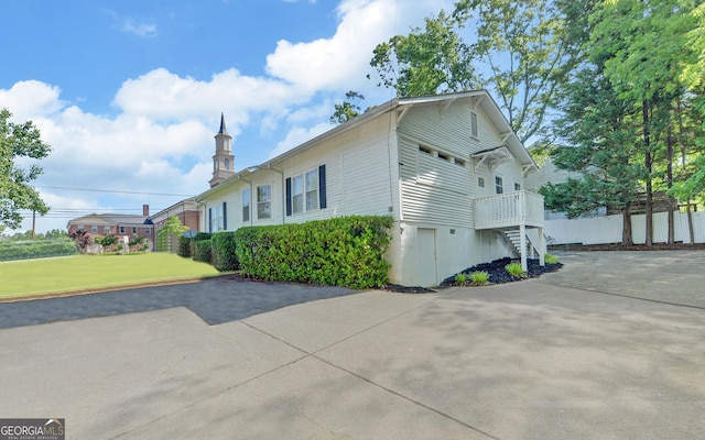 276 E Tugalo St, Toccoa, GA 30577 - view of home's exterior featuring driveway and stairway