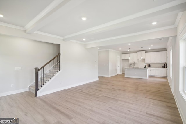 5344 Milford Dr Unit 183A, Gainesville, GA 30507 - unfurnished living room with beam ceiling, light wood-style flooring, stairs, ornamental molding, and recessed lighting