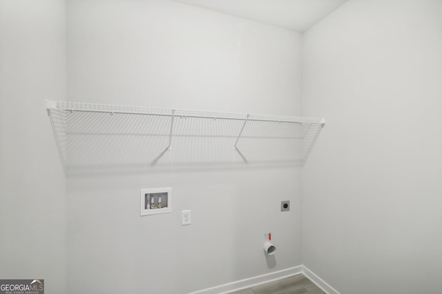 5344 Milford Dr Unit 183A, Gainesville, GA 30507 - washroom with hookup for an electric dryer, washer hookup, baseboards, and wood finished floors