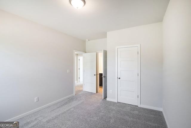 5344 Milford Dr Unit 183A, Gainesville, GA 30507 - unfurnished bedroom featuring carpet flooring and baseboards