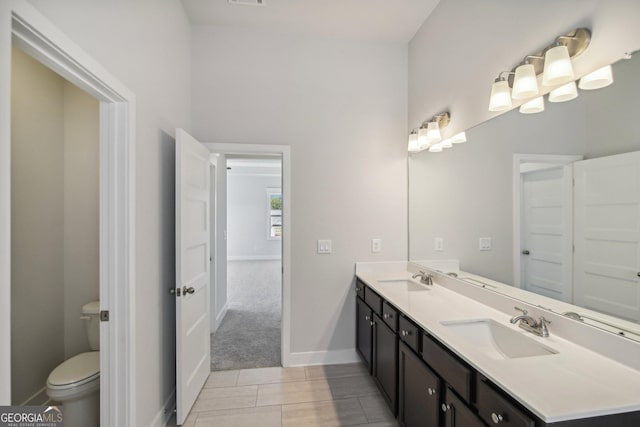 5344 Milford Dr Unit 183A, Gainesville, GA 30507 - full bathroom featuring toilet, double vanity, and baseboards