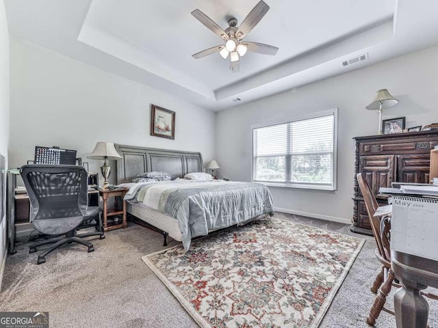 3931 Upper Bethany Rd, Ball Ground, GA 30107 - carpeted bedroom with a raised ceiling, a desk, a ceiling fan, and baseboards