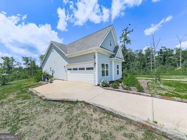 3931 Upper Bethany Rd, Ball Ground, GA 30107 - view of home's exterior with driveway, a garage, a yard, and roof with shingles
