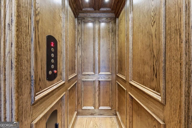6678 Gaines Ferry Rd, Flowery Branch, GA 30542 - elevator with ornamental molding and a decorative wall