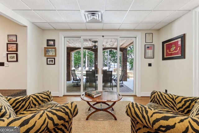 6678 Gaines Ferry Rd, Flowery Branch, GA 30542 - sitting room featuring light wood-type flooring, french doors, and a drop ceiling