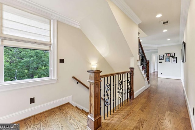 6678 Gaines Ferry Rd, Flowery Branch, GA 30542 - stairs featuring wood finished floors, recessed lighting, and crown molding
