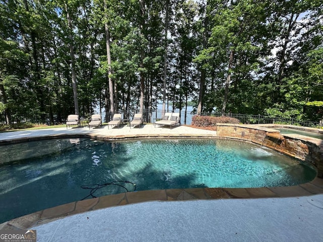 6678 Gaines Ferry Rd, Flowery Branch, GA 30542 - view of swimming pool featuring a patio and a pool with connected hot tub