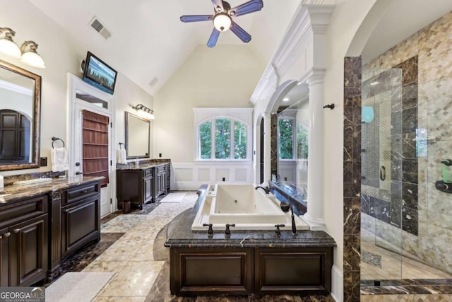 6678 Gaines Ferry Rd, Flowery Branch, GA 30542 - bathroom with a shower stall, ornate columns, ceiling fan, two vanities, and a jetted tub