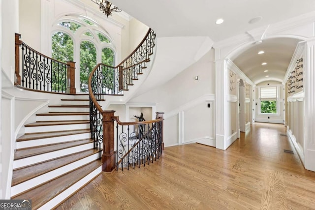 6678 Gaines Ferry Rd, Flowery Branch, GA 30542 - entrance foyer with wood finished floors, recessed lighting, stairs, and a decorative wall