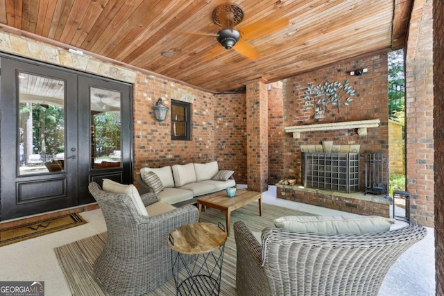 6678 Gaines Ferry Rd, Flowery Branch, GA 30542 - living area featuring wood ceiling, a brick fireplace, and brick wall