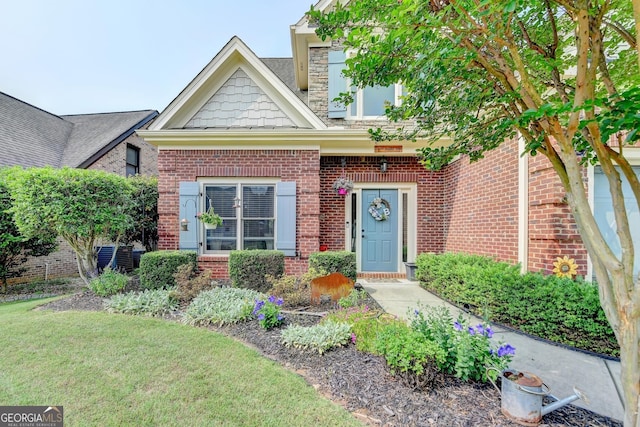 2469 Martini Way, Bethlehem, GA 30620 - view of front of house with brick siding, central AC unit, and a front yard
