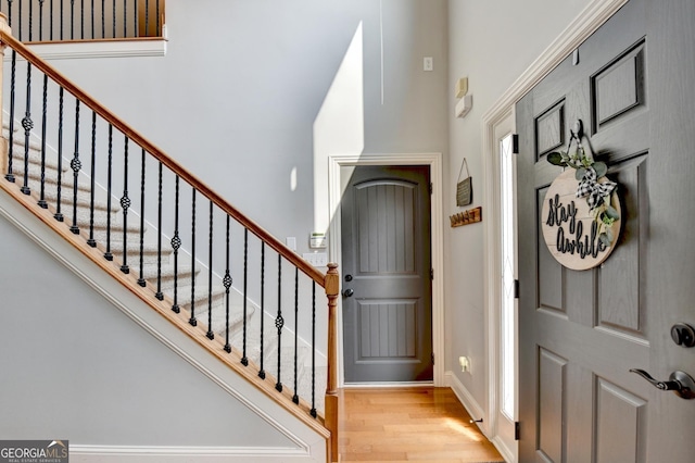 2469 Martini Way, Bethlehem, GA 30620 - entrance foyer with wood finished floors, stairs, and a towering ceiling