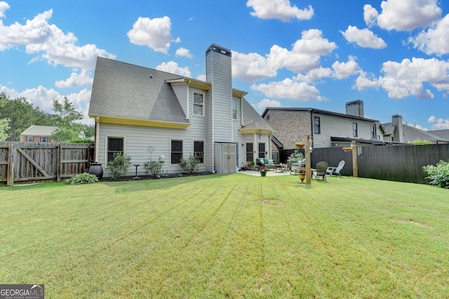 2469 Martini Way, Bethlehem, GA 30620 - back of house with a patio area and a chimney
