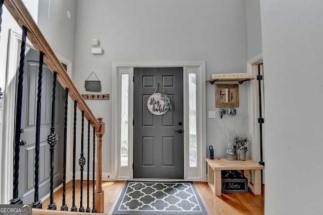 2469 Martini Way, Bethlehem, GA 30620 - foyer with light wood-style flooring, stairway, and a towering ceiling