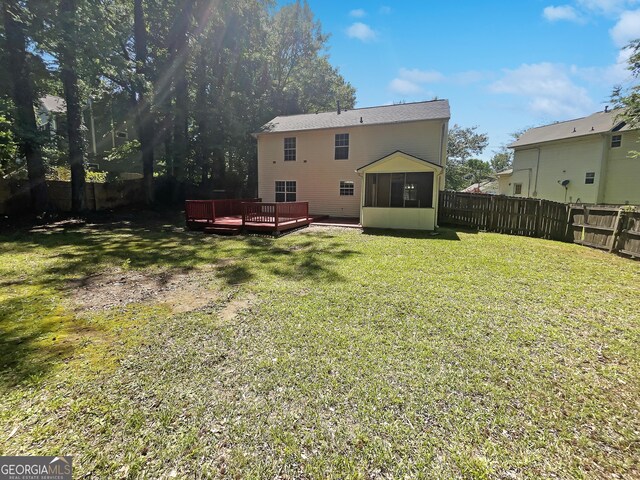 1503 Colt Ridge Ln SE, Mableton, GA 30126 - back of house with a sunroom and a deck