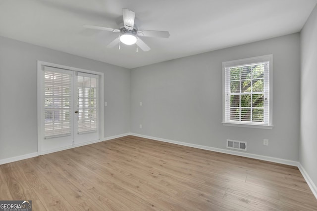 4516 Creekwood Cir NW, Kennesaw, GA 30152 - empty room featuring light wood-type flooring, baseboards, and a ceiling fan