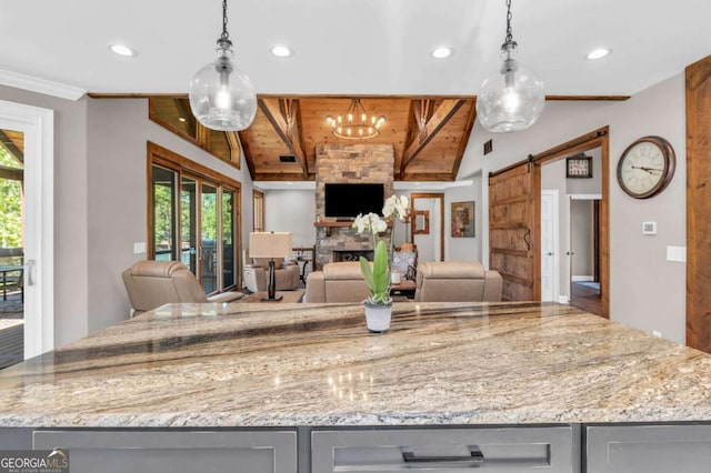 117 Valley View Ct, Blairsville, GA 30512 - kitchen featuring gray cabinets, recessed lighting, healthy amount of natural light, light stone countertops, and lofted ceiling