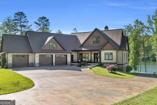 117 Valley View Ct, Blairsville, GA 30512 - view of front of home featuring concrete driveway, stone siding, a front lawn, a garage, and a chimney
