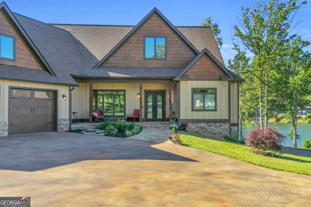 117 Valley View Ct, Blairsville, GA 30512 - craftsman-style house featuring french doors, roof with shingles, board and batten siding, driveway, and an attached garage
