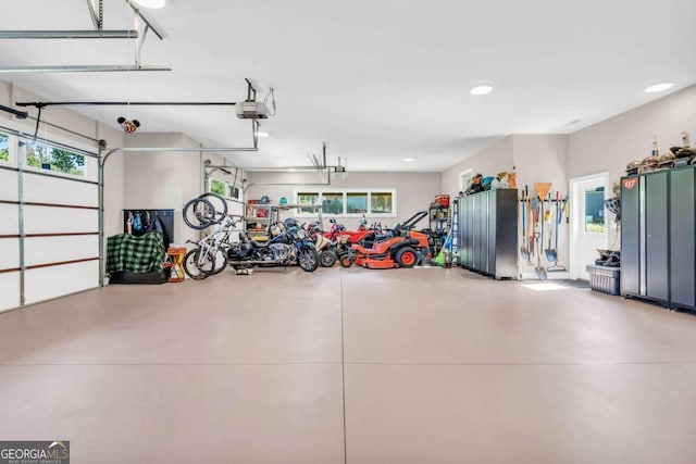 117 Valley View Ct, Blairsville, GA 30512 - garage featuring freestanding refrigerator, recessed lighting, and a garage door opener