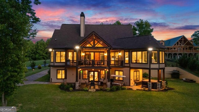 117 Valley View Ct, Blairsville, GA 30512 - back of property featuring a patio area, a yard, a chimney, and a deck