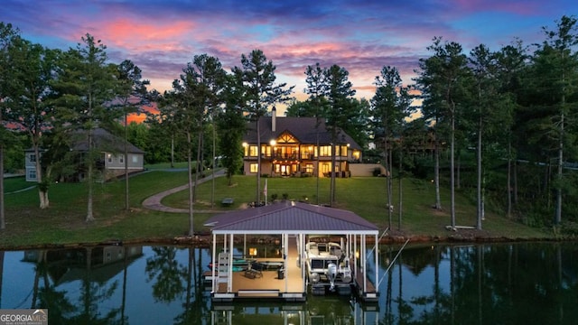 117 Valley View Ct, Blairsville, GA 30512 - dock featuring boat lift, a water view, and a lawn