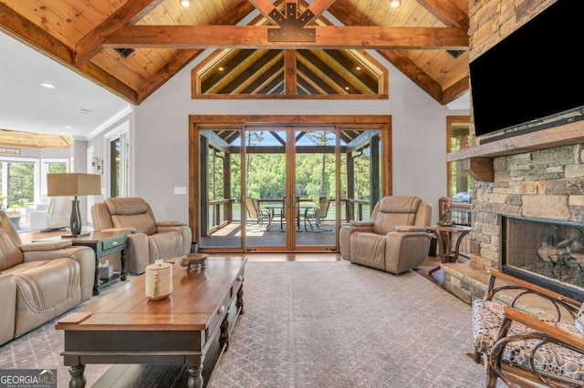 117 Valley View Ct, Blairsville, GA 30512 - living area with french doors, wood ceiling with exposed beams, high vaulted ceiling, a stone fireplace, and recessed lighting