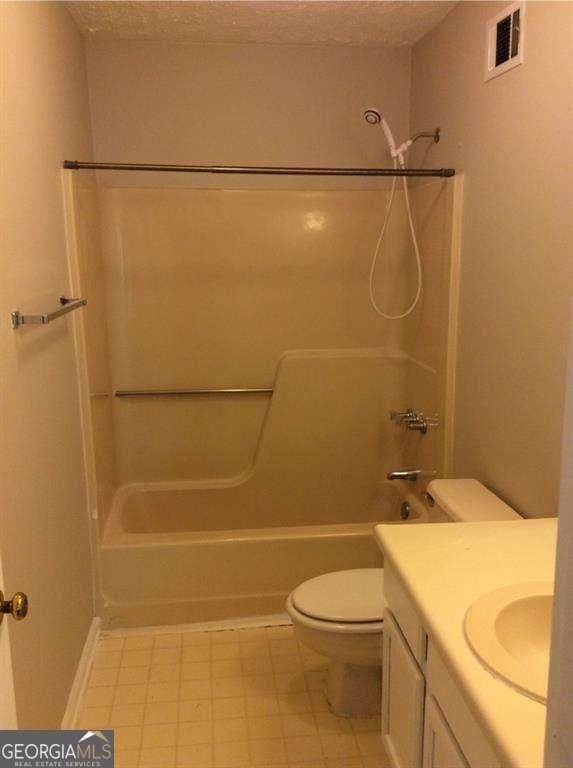 136STERLINGCO Sterling Ct, Alpharetta, GA 30004 - full bath with toilet, shower / washtub combination, vanity, and tile patterned floors