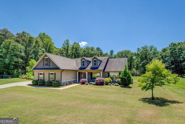 70 Country Meadows Ln, Covington, GA 30014 - cape cod house with a front lawn and stone siding