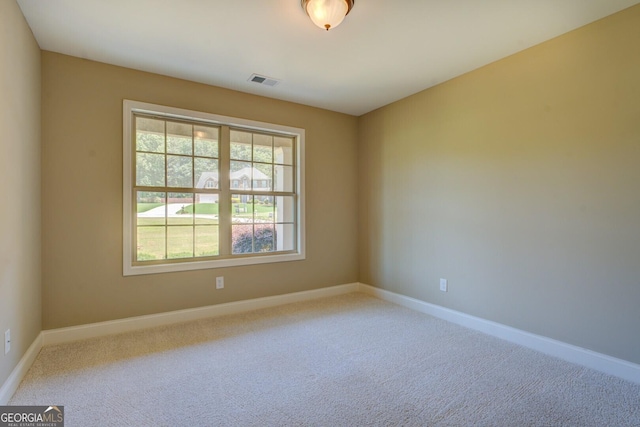 70 Country Meadows Ln, Covington, GA 30014 - carpeted empty room featuring baseboards