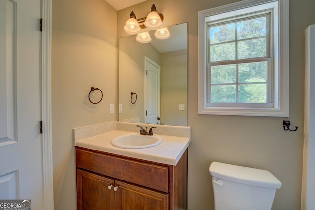 70 Country Meadows Ln, Covington, GA 30014 - half bathroom with vanity and toilet