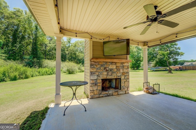 70 Country Meadows Ln, Covington, GA 30014 - view of patio / terrace featuring an outdoor stone fireplace and ceiling fan