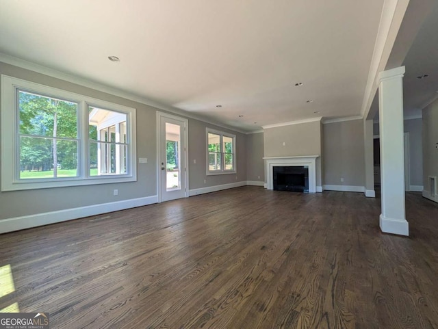 8239 High Lake Ter, Covington, GA 30014 - unfurnished living room featuring ornamental molding, dark wood-style flooring, baseboards, a fireplace, and recessed lighting