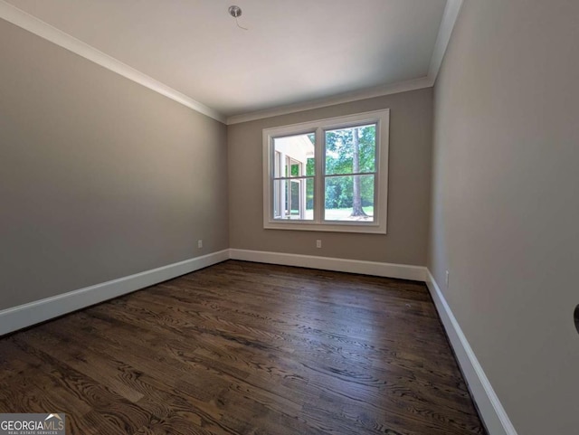 8239 High Lake Ter, Covington, GA 30014 - unfurnished room featuring crown molding, dark wood-style flooring, and baseboards