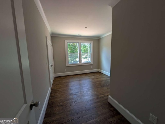 8239 High Lake Ter, Covington, GA 30014 - unfurnished room with dark wood-style flooring, ornamental molding, and baseboards