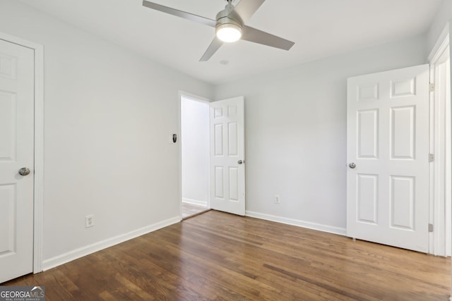 623 Montevista St SW, Atlanta, GA 30310 - unfurnished bedroom featuring wood finished floors, baseboards, and ceiling fan
