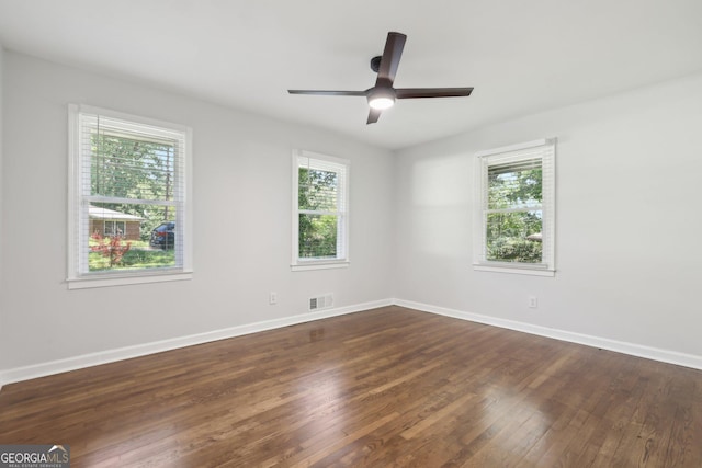 623 Montevista St SW, Atlanta, GA 30310 - unfurnished room with dark wood-style floors, baseboards, and ceiling fan