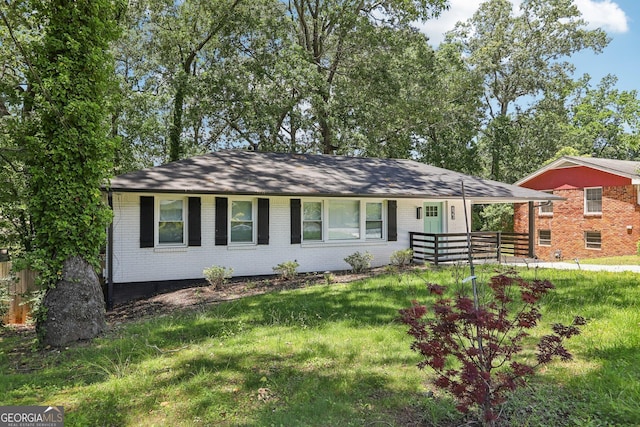 623 Montevista St SW, Atlanta, GA 30310 - view of front facade with brick siding and a front yard